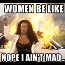 Kép: Nő pózol mögötte égő autóval. Felirat: Women be like nope I ain't mad.